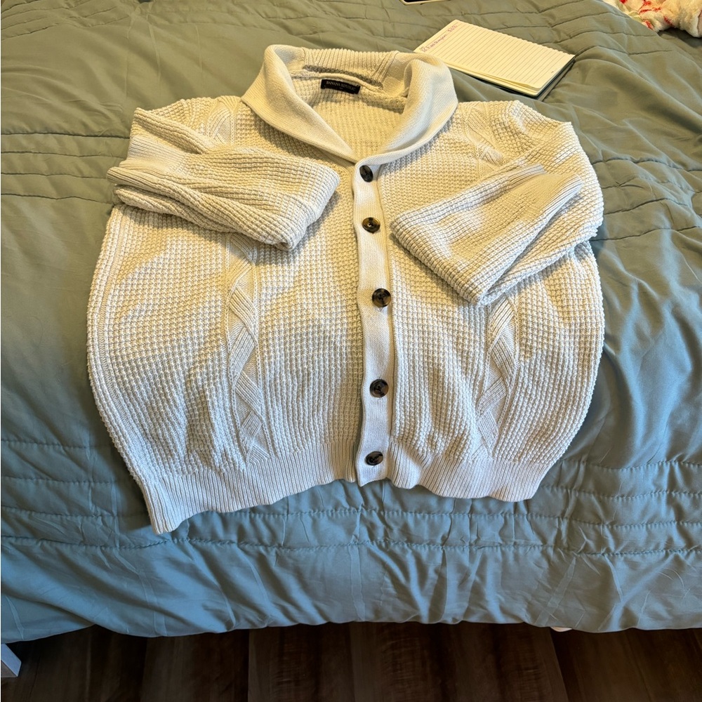 Cozy White Button-Up cardigan.